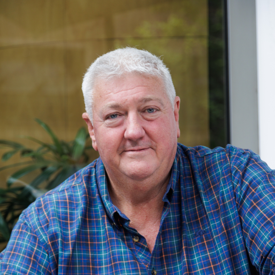 Headshot of Mark Elgar — Director